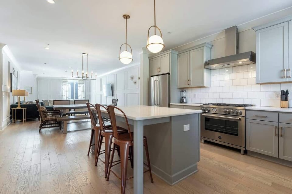 Cook like a pro in this stylish space with modern appliances and inviting bar seating!