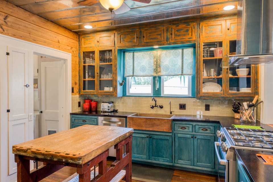 Hammered copper sink, antique butcher block and other unique features