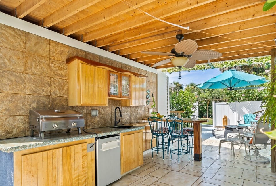 Outdoor kitchen wide view. 