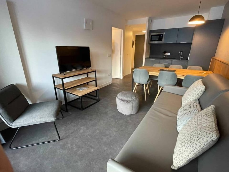 Snuggle up with a cup of coffee or tea on the comfortable sofa.