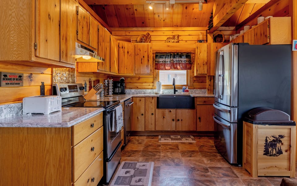 Large, updated kitchen with modern appliances makes preparing meals a pleasure