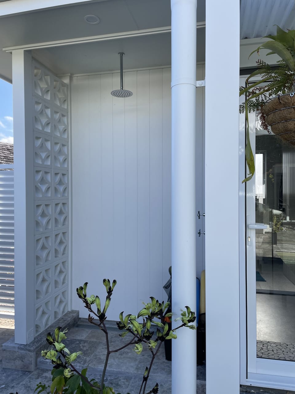 Outdoor shower adjacent to studio