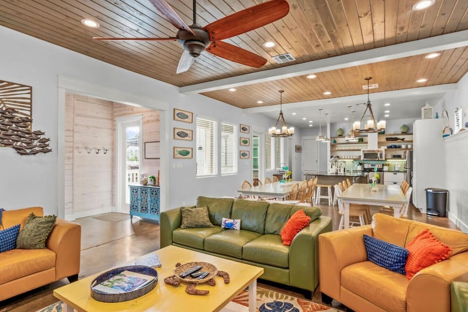 Bright and breezy open-concept living with colorful coastal decor—perfect for entertaining and unwinding.