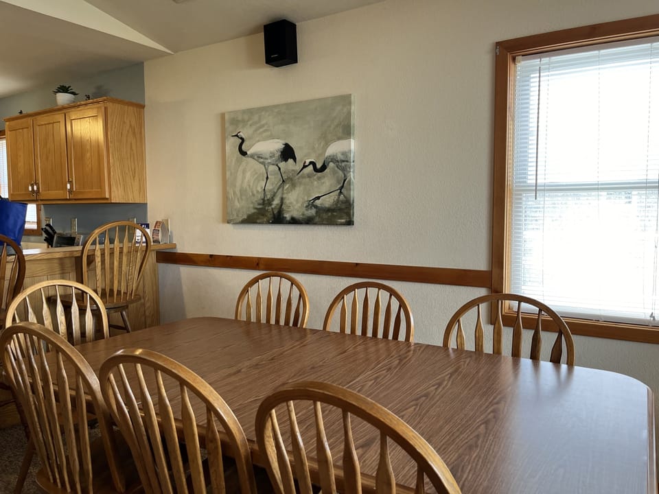 Dining Area - Enjoy the high ceilings, and ocean views throughout the living and dining spaces of this oceanside beauty.