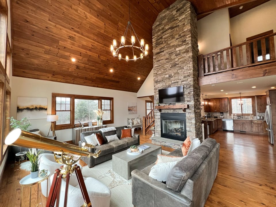 There is ample seating area in the great room overlooking the mountain.