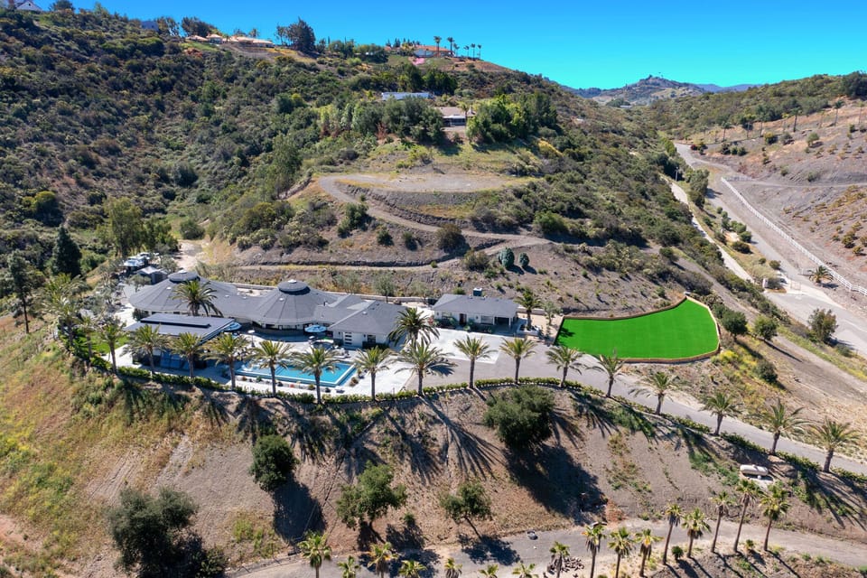 Hilltop luxury with sweeping views and total privacy all around!