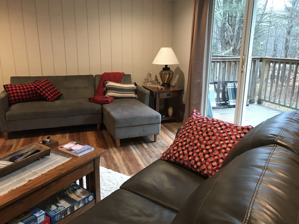 The deck off the living room overlooks a wooded area -
patio chairs provided 