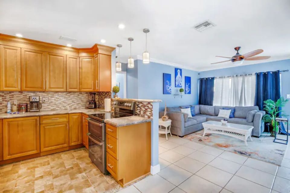 Complete Kitchen and Living Room with Sectional Sleeper Sofa.