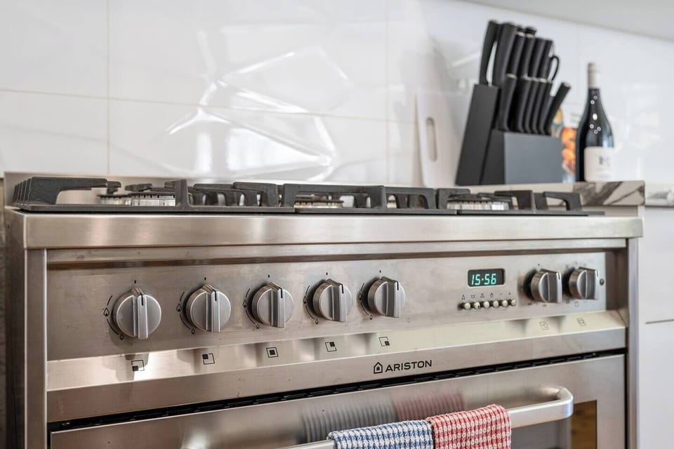 A five-burner stove makes it easy to cook up a feast for the whole family.