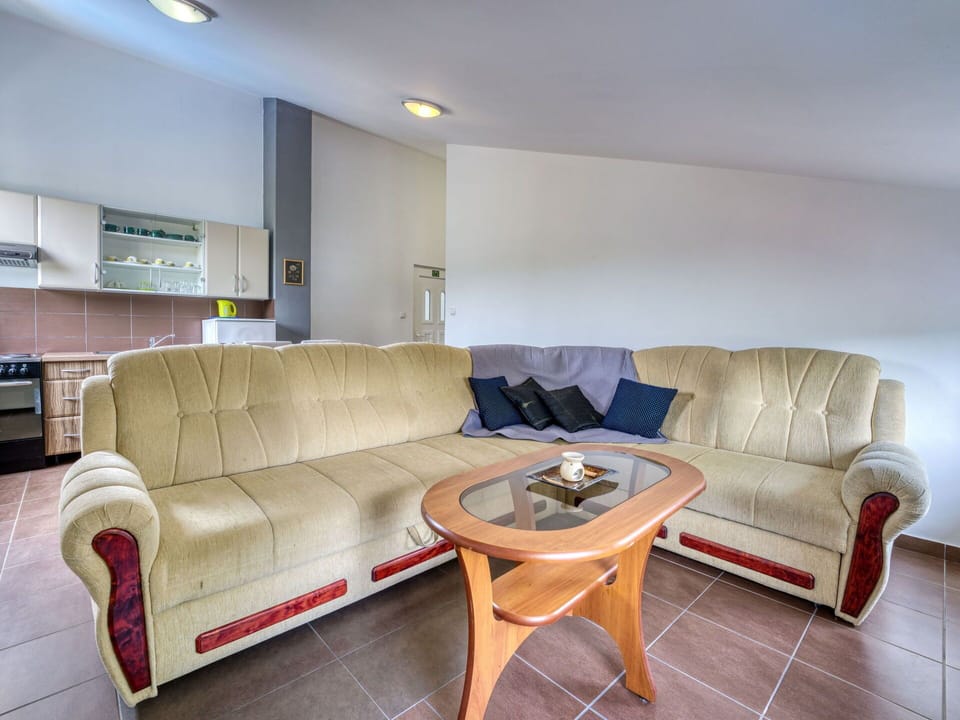 Furniture, Couch, Flooring, Interior Design, Floor, Wood, Room, Living Room, Ceiling