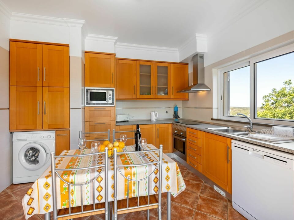 Cabinetry, Furniture, Countertop, Building, Property, Kitchen Sink, Tap, Kitchen Stove, Sink, Home Appliance