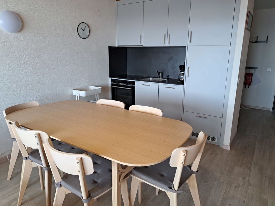 Furniture, Table, Building, Chair, Cabinetry, Kitchen & Dining Room Table, Interior Design, Wood, Television, Flooring