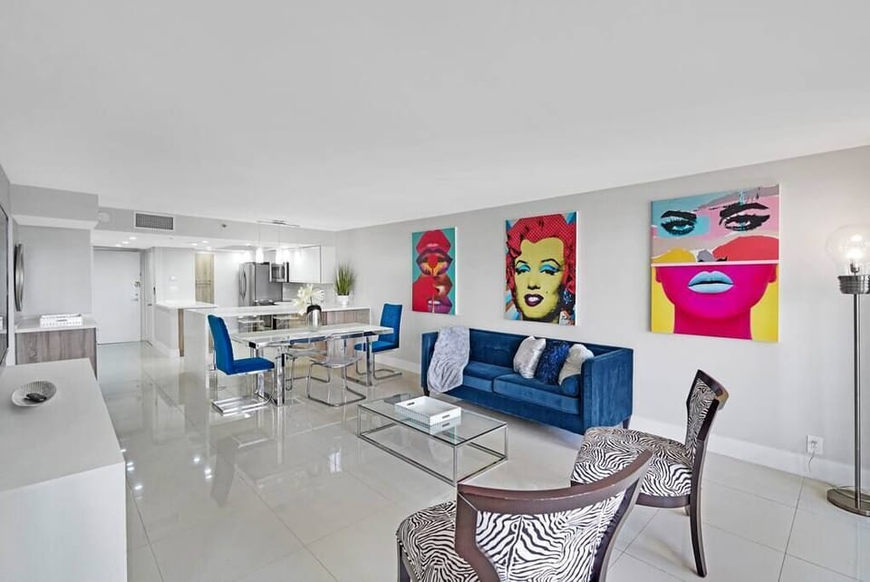 Dining area, living room with Roku tv and balcony access