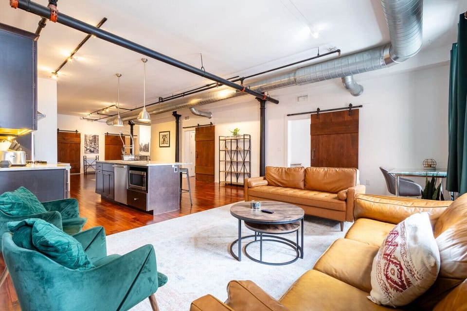 Bright living space with sectional sofa and natural light