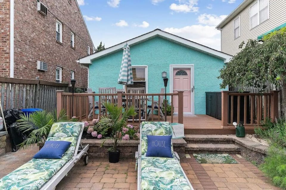 Charming beach cottage with a cozy deck and relaxing outdoor space