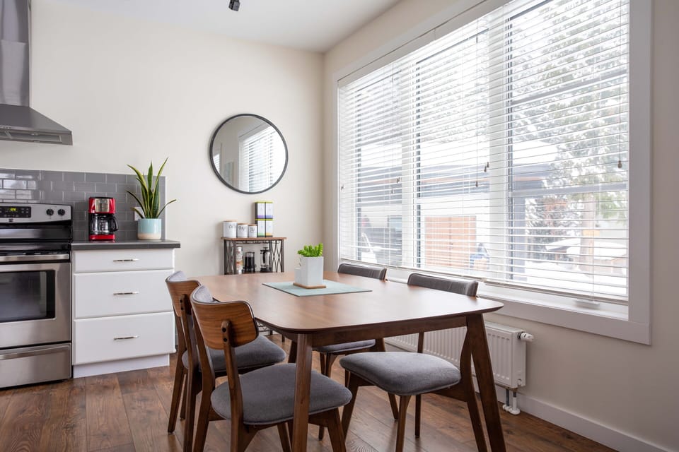 Large windows that allows natural light to pour in.  Two windows open wide.