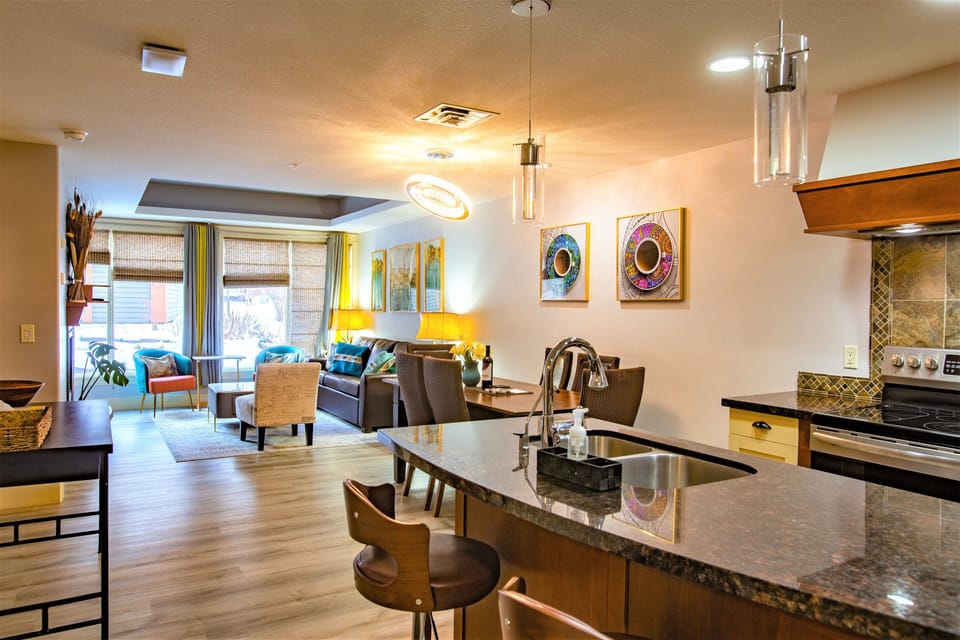 Fully equipped kitchen with stainless steel appliances and granite countertops