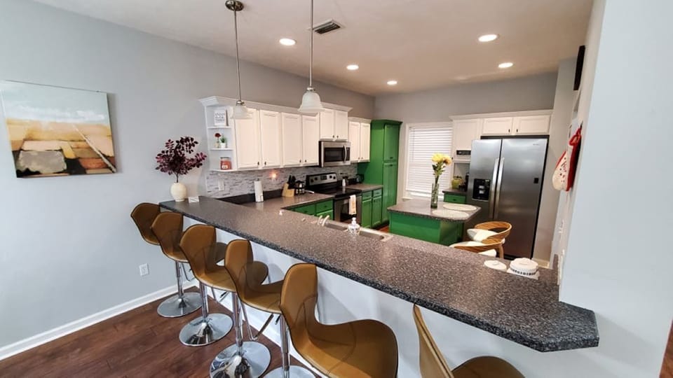 Bartop counter seats six people comfortably. Great for breakfast or buffets.