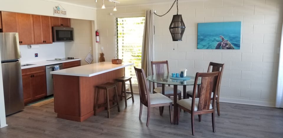 Kitchen with toaster oven, rice maker, crock pot, and drip coffee maker, 