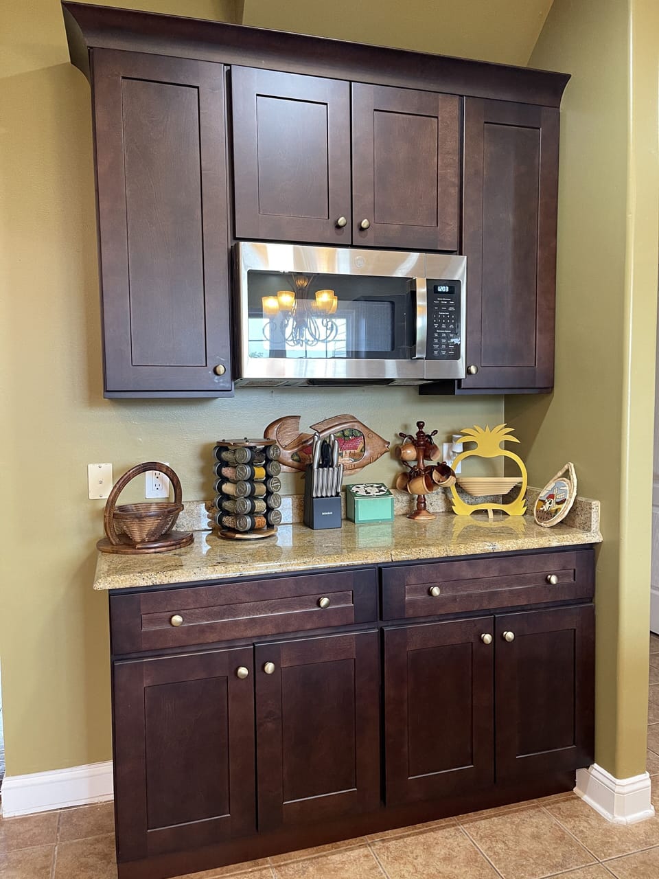 Exquisite cabinetry in the kitchen with granite countertops 