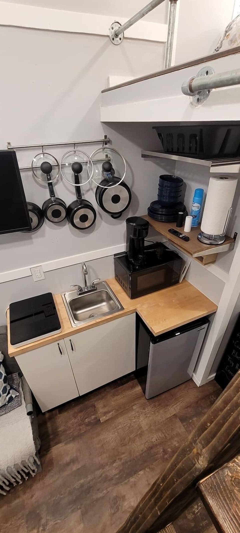 Above view of kitchen with mounted TV