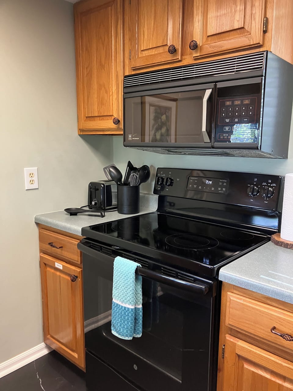 Microwave and glass top electric oven.