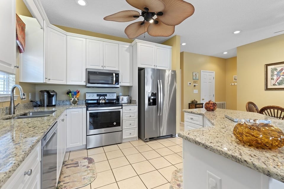 Large kitchen with modern appliances. 