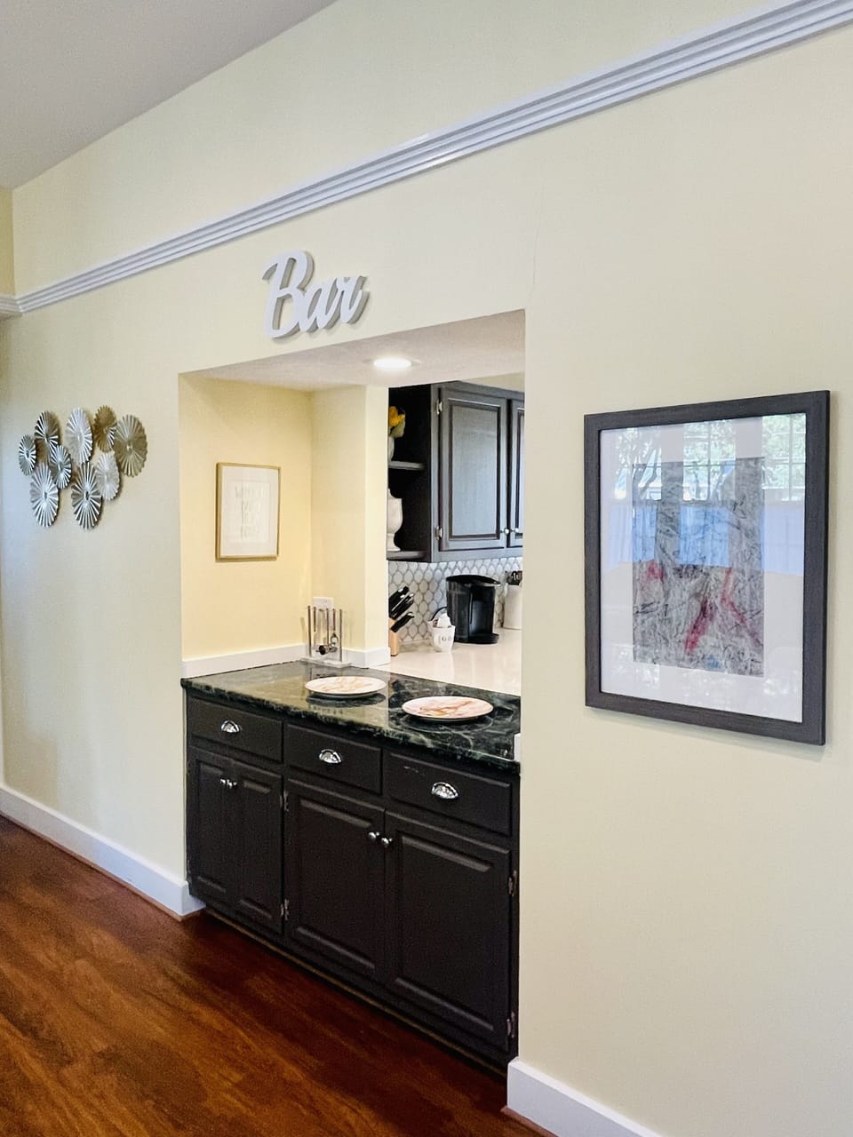 Bar connecting Kitchen to Dining Room is perfect for fixing adult beverages.