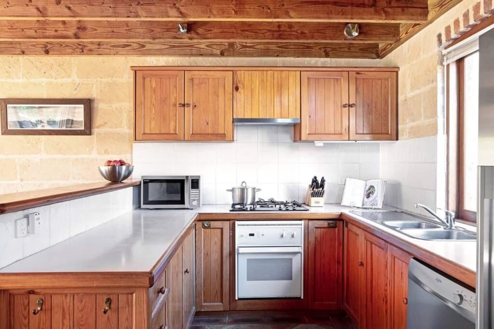 Fully equipped kitchen with full sized fridge/freezer, microwave and dishwasher