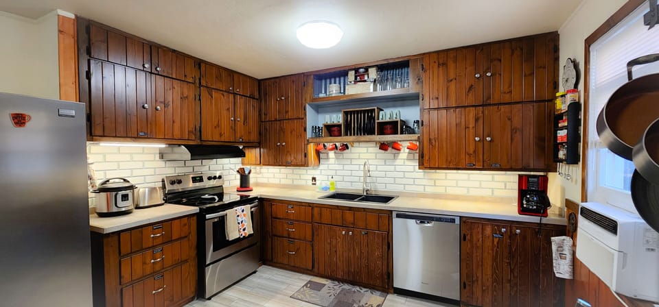 Fully Stocked Kitchen. Flour, spices, cooking oil, toaster, pots, pans, etc.