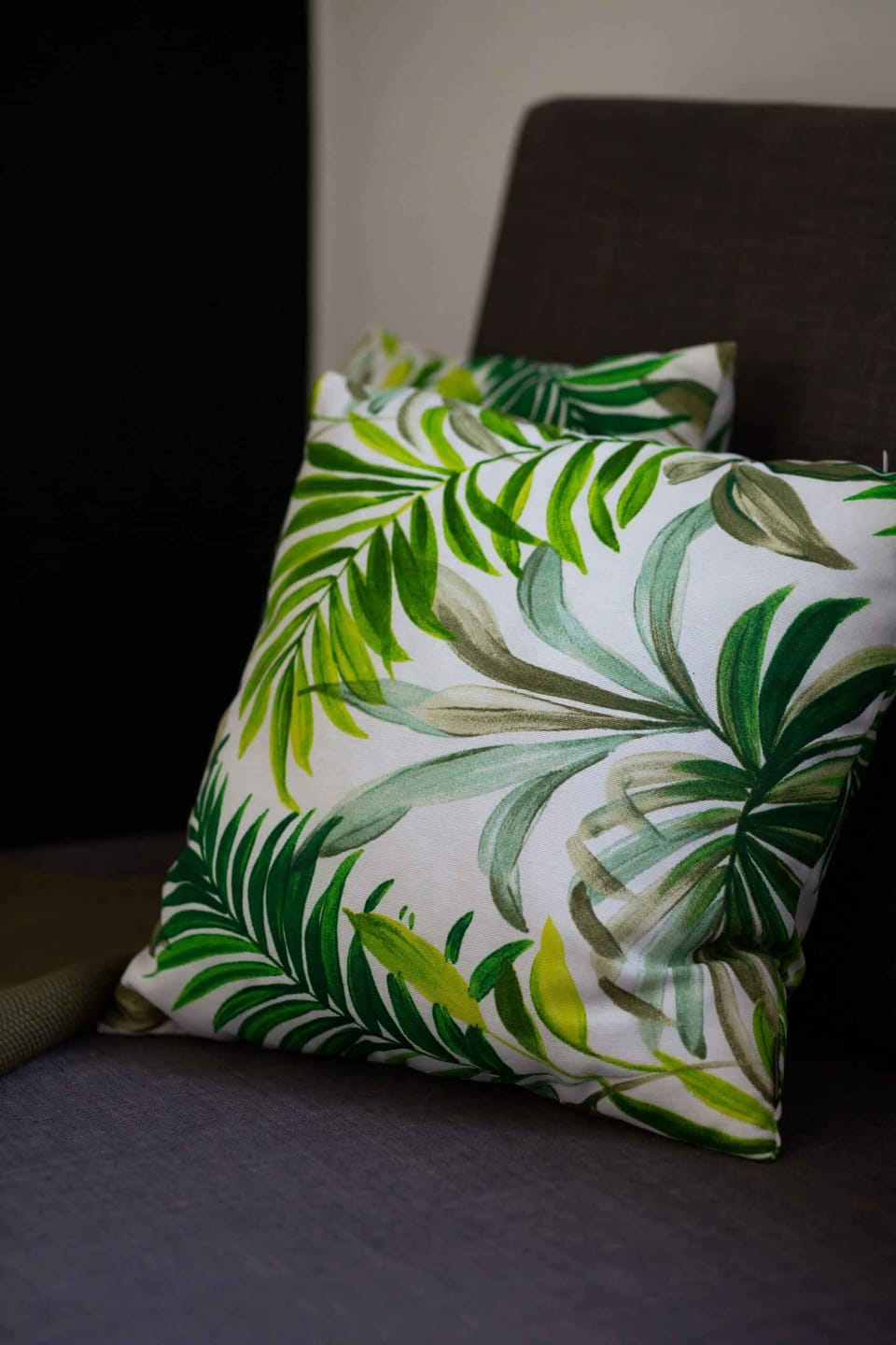Close-up of a decorative leaf cushion.