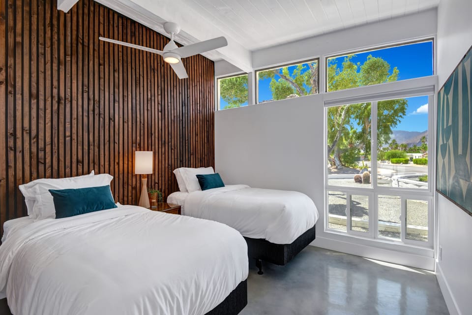 Stare at the stars above the mountaintops from one of the twin beds.