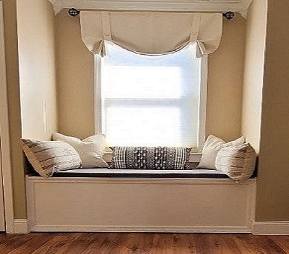 Window seat with view out to pool


