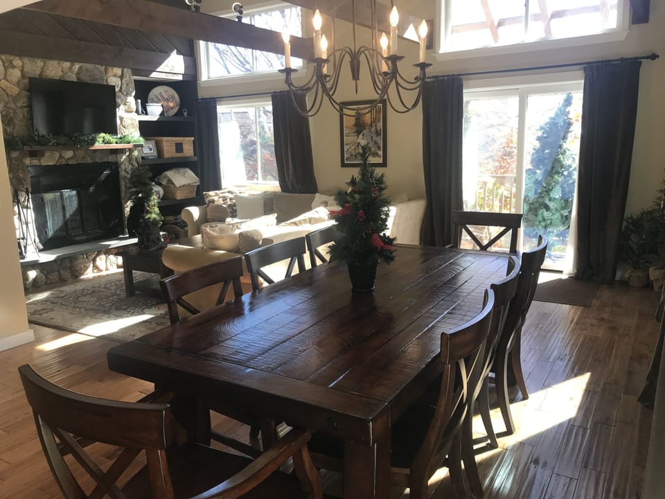 Open concept main level living space with hardwood floors 