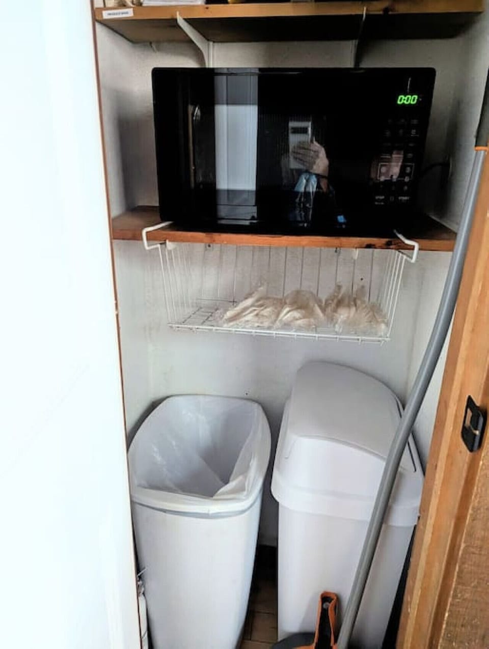 Pantry closet for trash, microwave and any extras