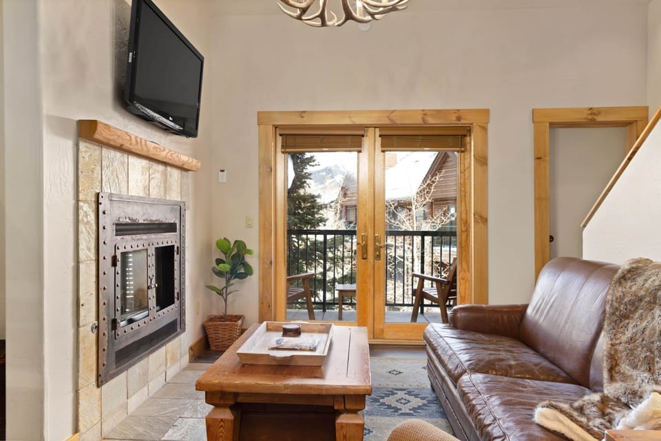 Fireplace and vaulted ceilings in the living room