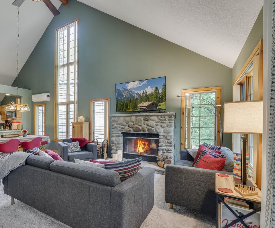 Great Room - Wood burning fireplace (wood provided), 65 inch smart TV with cable