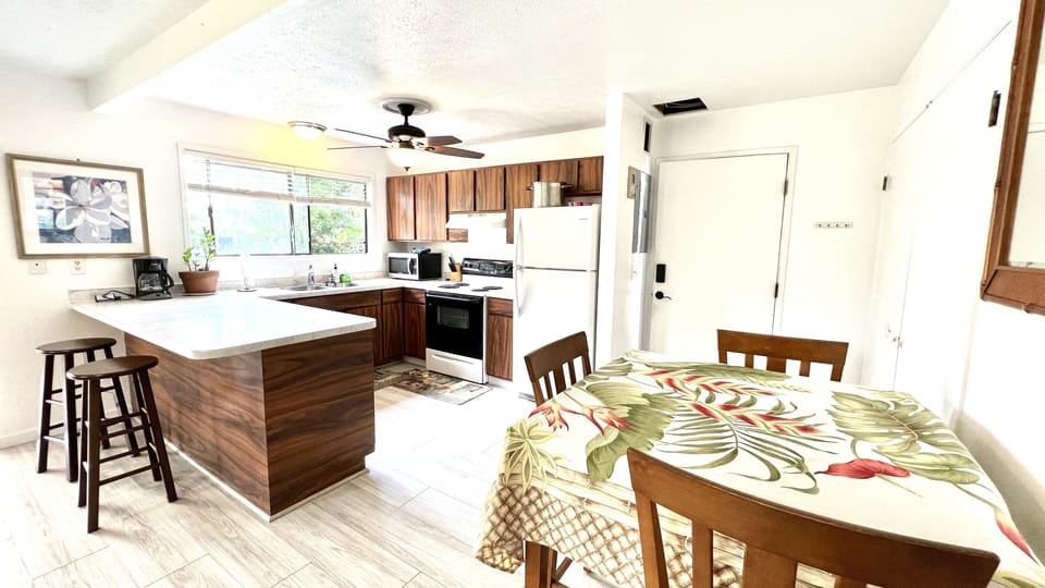 Full kitchen with oven and full size fridge