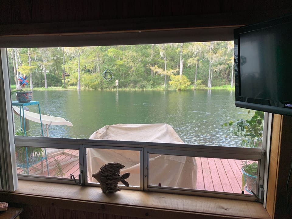 Master bedroom with wonderful view of river.