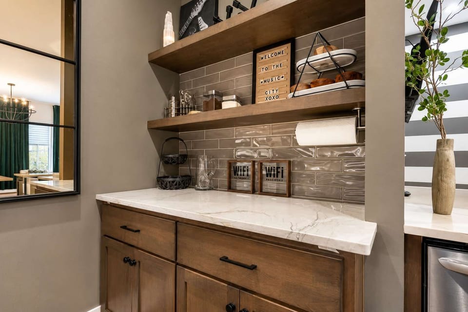 Create smoothies, mix drinks, or brew fresh coffee in this inviting kitchen space.