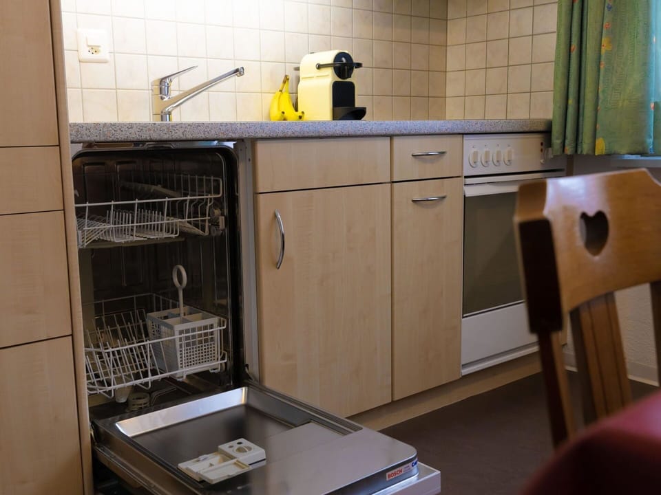 Property, Cabinetry, Wood, Kitchen Appliance, Floor, Flooring, Kitchen, Major Appliance, Gas