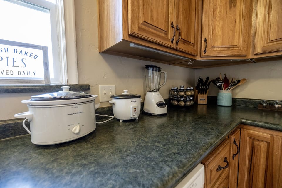 Whip up your culinary magic in this charming kitchen haven.