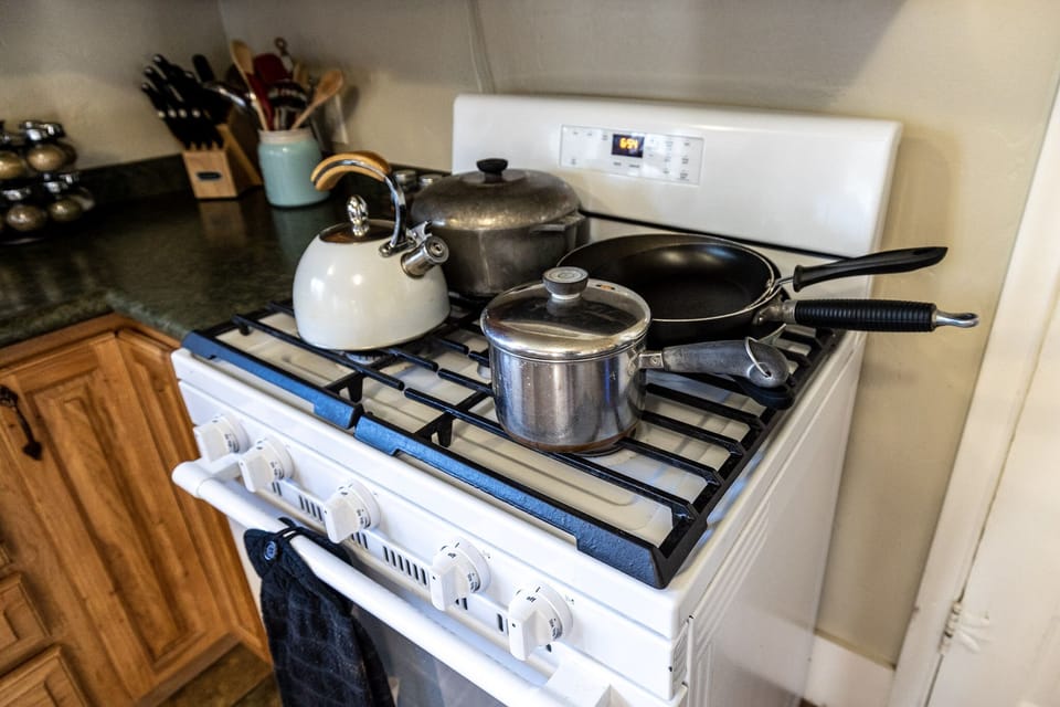 Whip up your culinary magic in this charming kitchen haven.