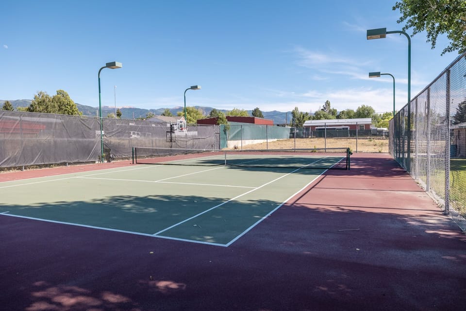 night & day private tennis court w/basketball hoop  