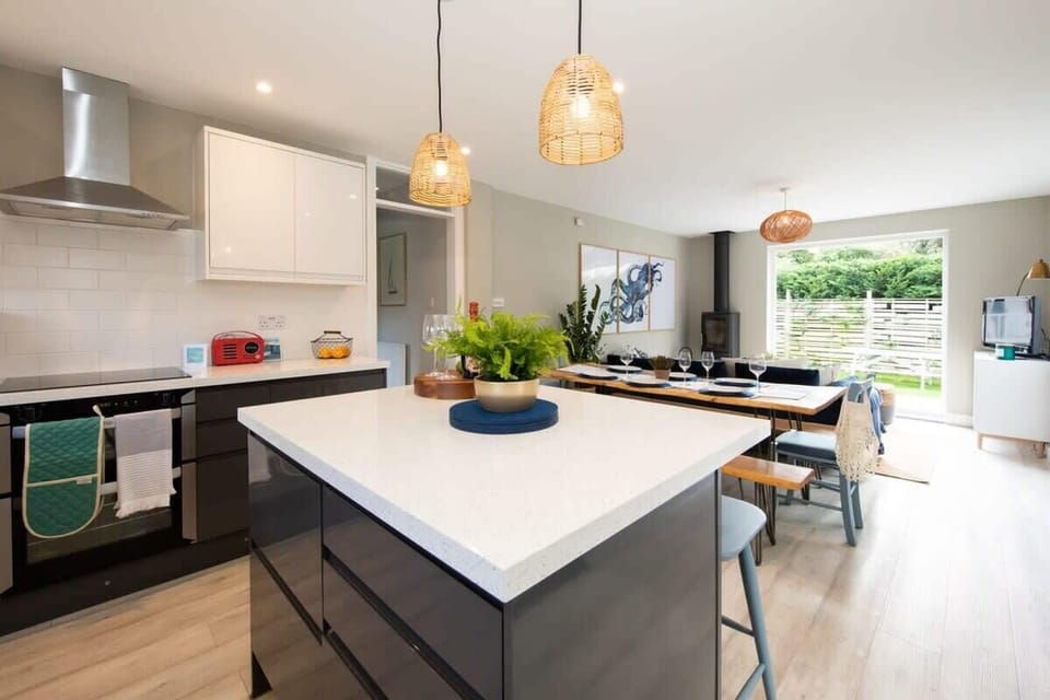 Gather together in the open plan living area and kitchen space