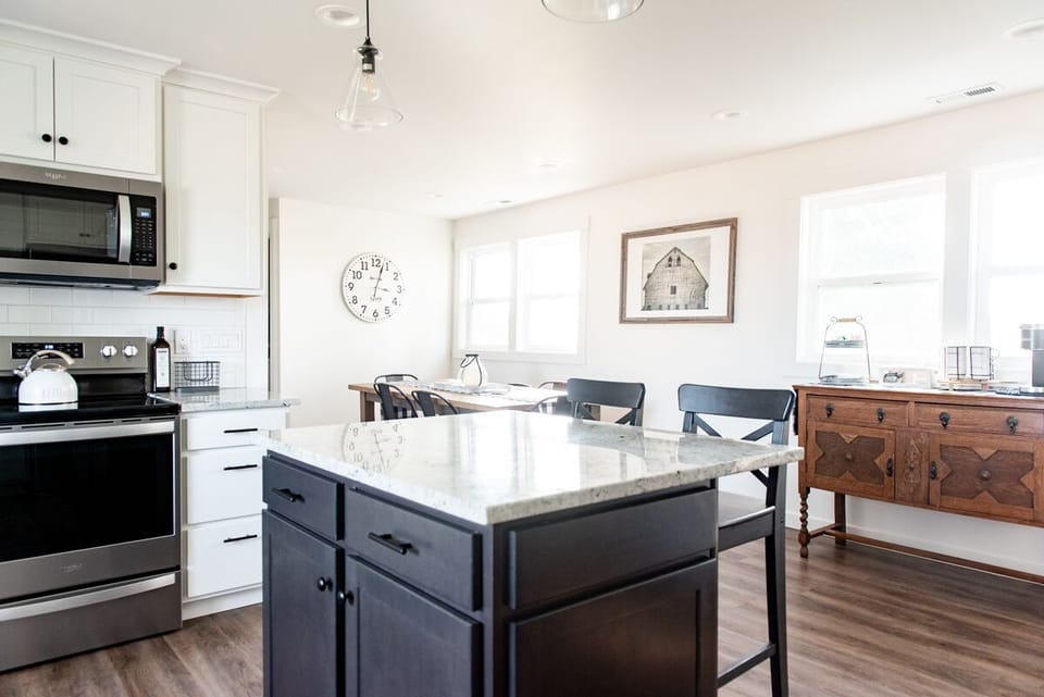 Well equipped kitchen with island. 