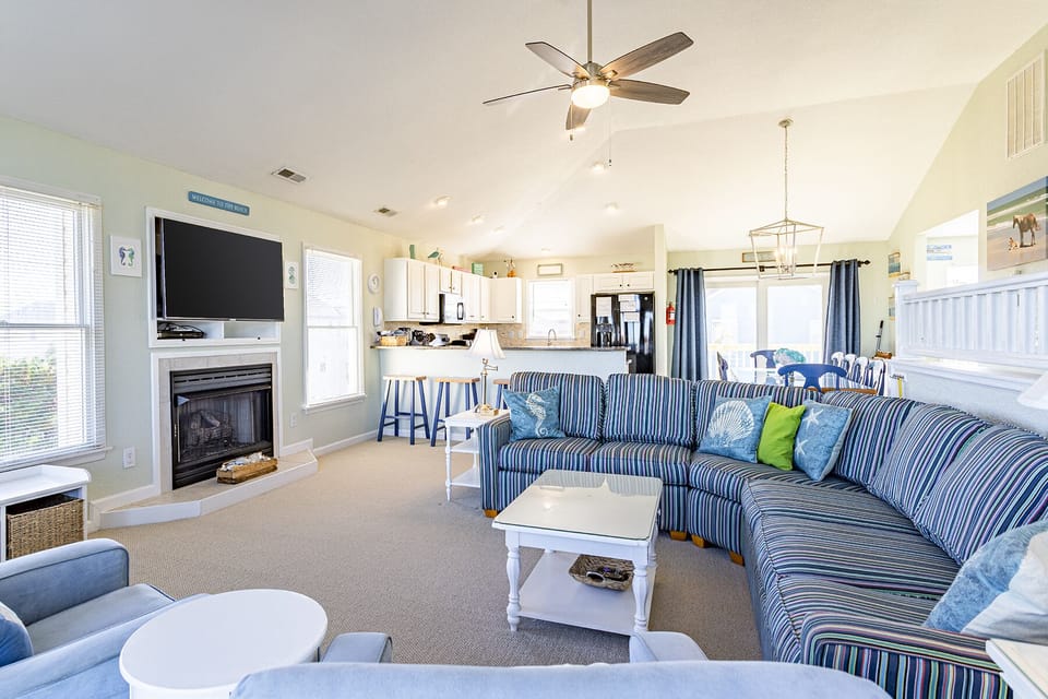 Living Room - Thoughtfully designed with the ocean in mind, this sea of blues provides a relaxing and inviting living space.