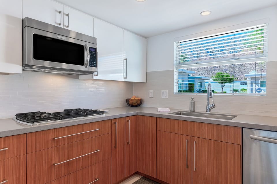 Majestic mountain view from kitchen sink plus gas cooktop