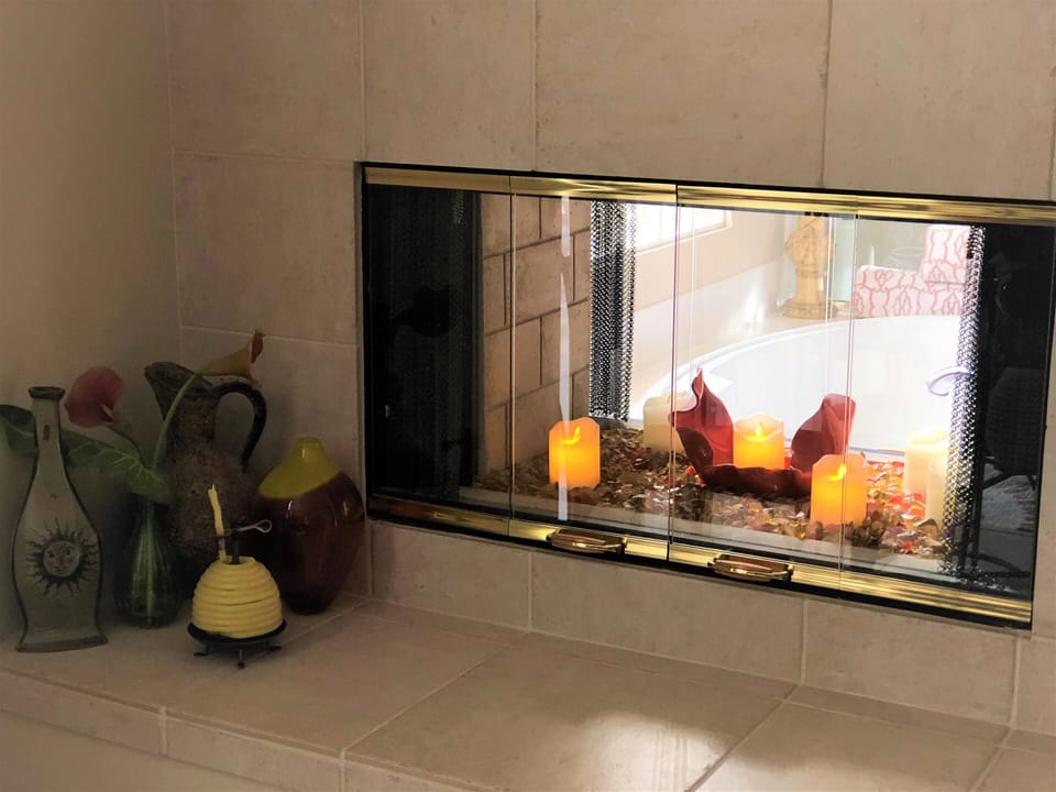 Dual Decorative Fireplace in Main bedroom and Bathroom.