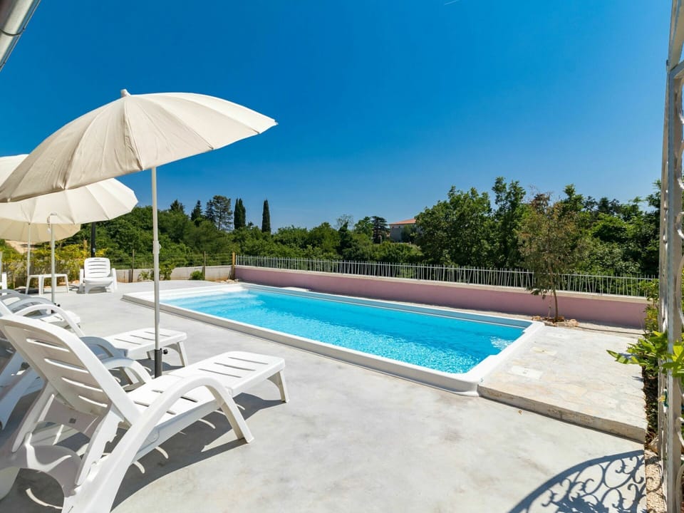 Water, Sky, Plant, Swimming Pool, Building, Azure, Shade, Tree, Outdoor Furniture, Sunlounger